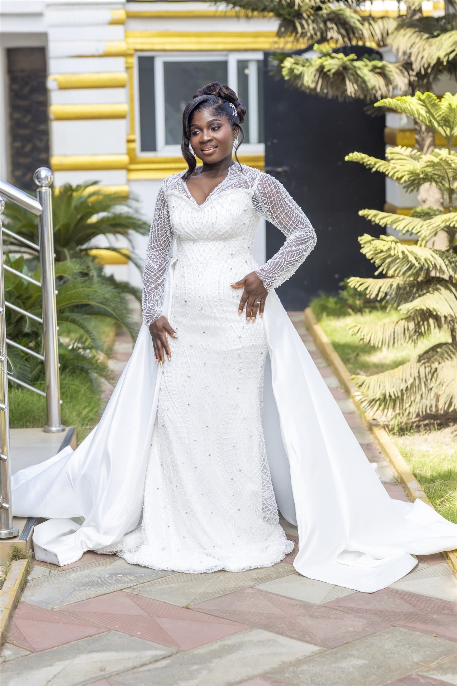 Full-length portrait of a bride in her wedding gown